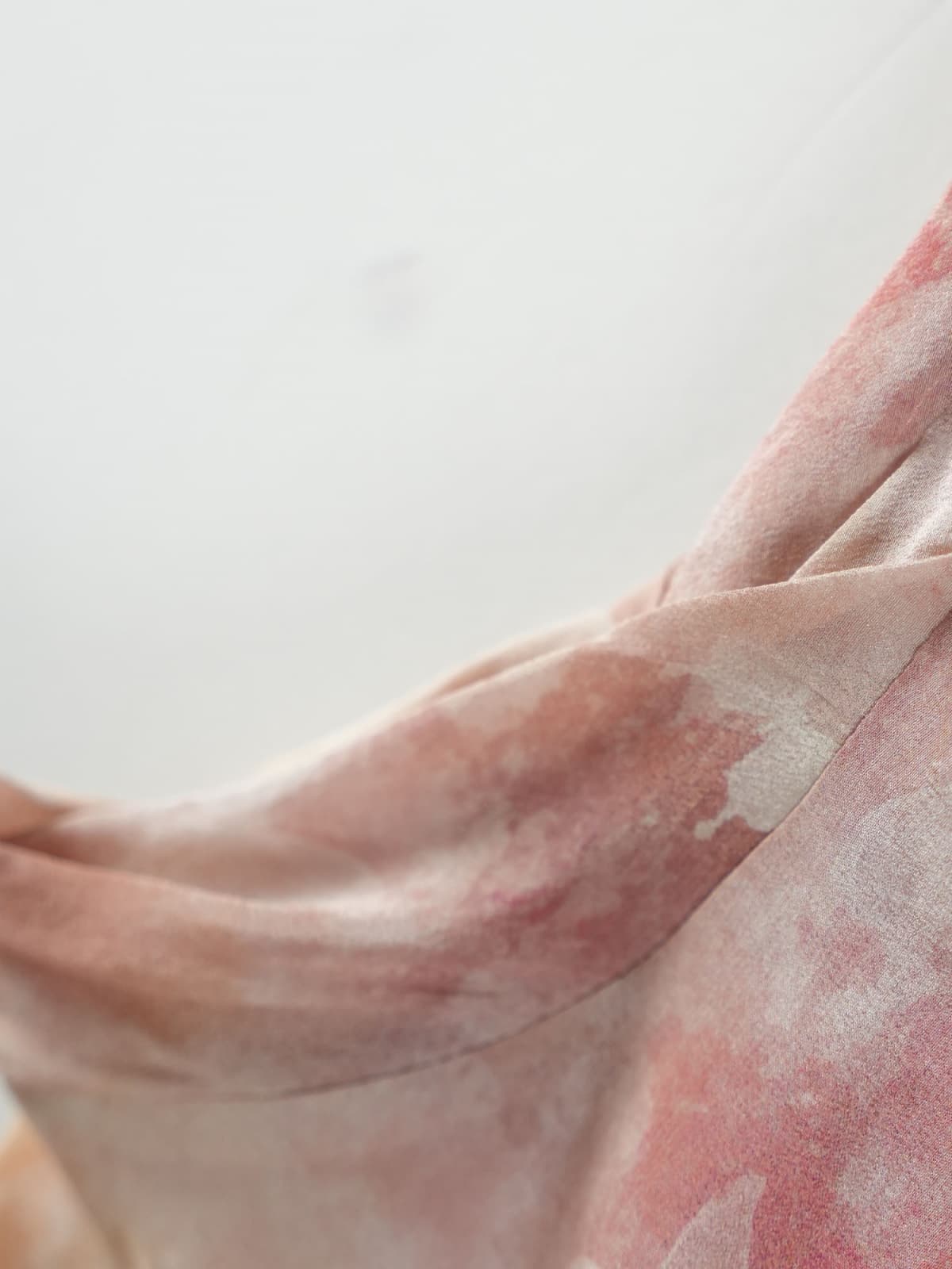 Close-up of the floral pattern on a Floral Mulberry Silk Midi Dress, showcasing its elegant fabric texture.