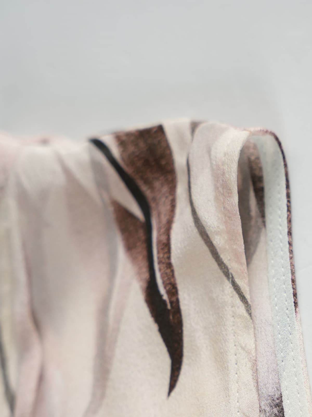 Detail of fabric print showcasing the design of the Sleeveless Floral Maxi Mulberry Silk Dress.