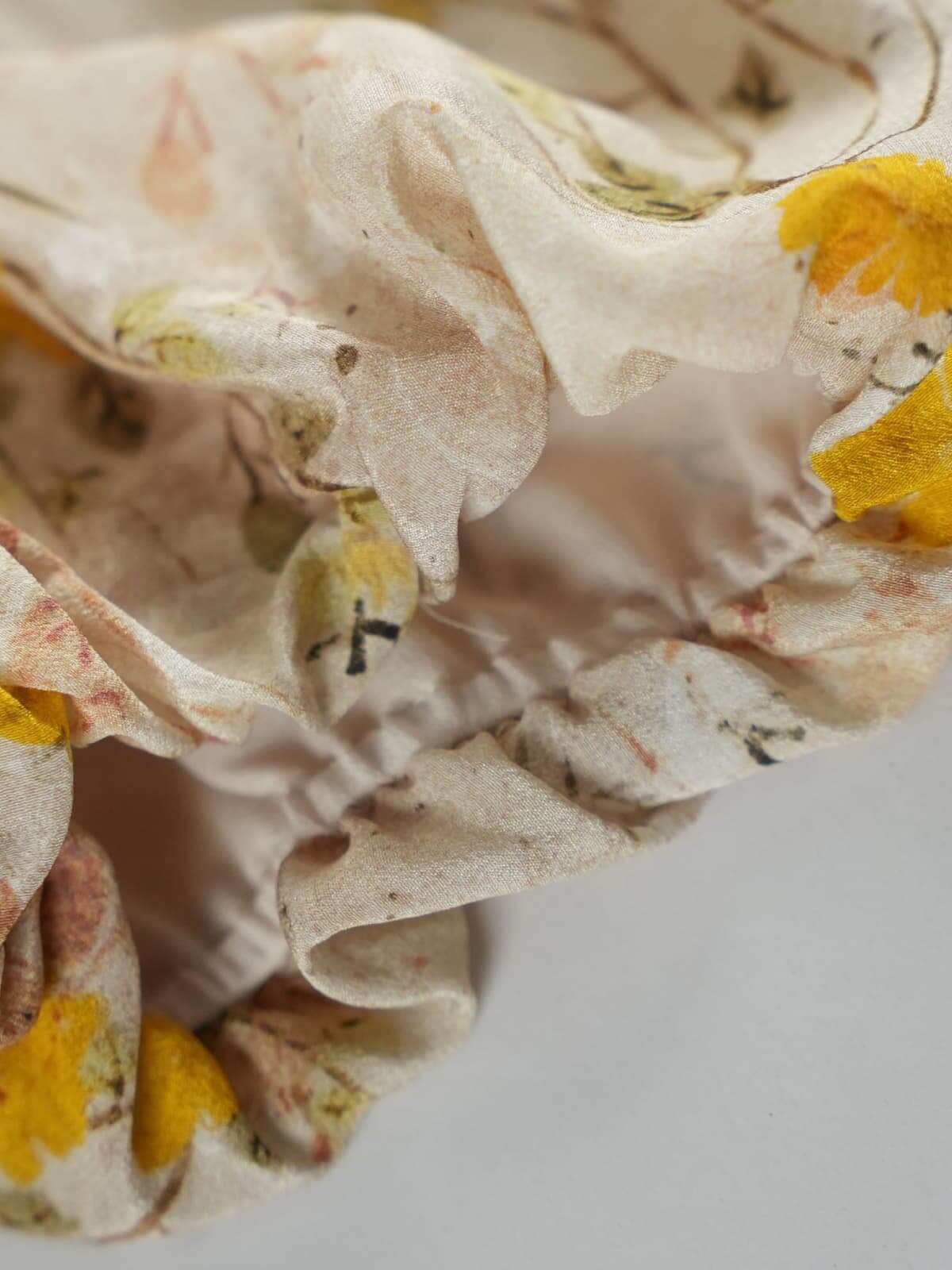Close-up of the fabric details showcasing the floral print of the French Floral Mulberry Silk Maxi Dress.