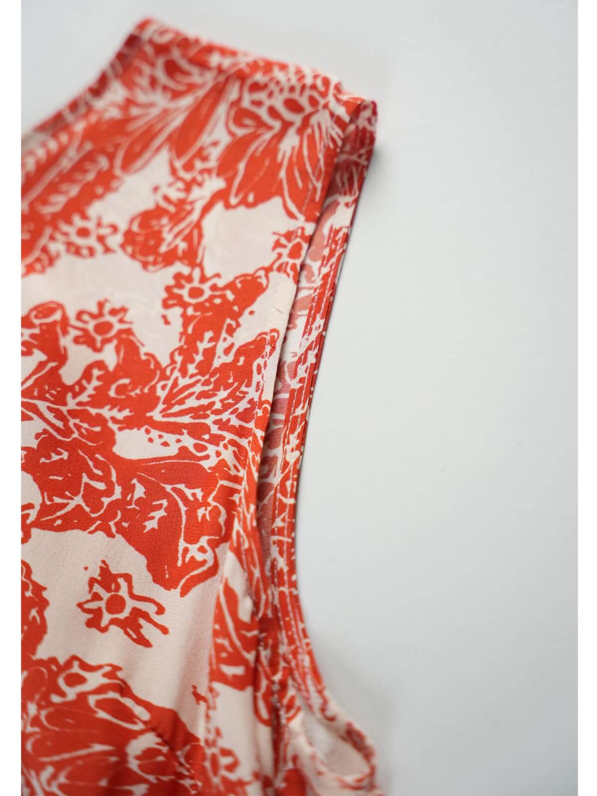 Graceful Mulberry Silk Maxi Dress featuring a vibrant red floral pattern on a white background.