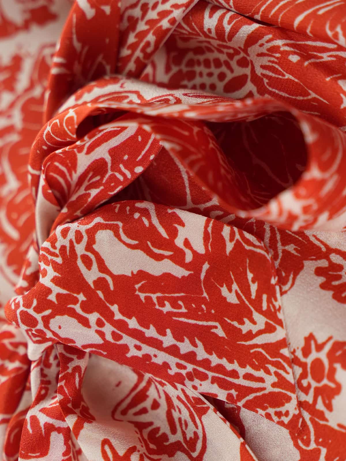 Graceful Mulberry Silk Maxi Dress featuring a vibrant red floral pattern on a white background.