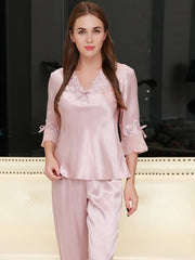 Front of Women's Lace Silk Pajama Set - Luxurious & Comfortable Nightwear in pink