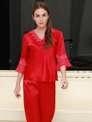 Front view ofWomen's Lace Silk Pajama Set - Luxurious & Comfortable Nightwear in red