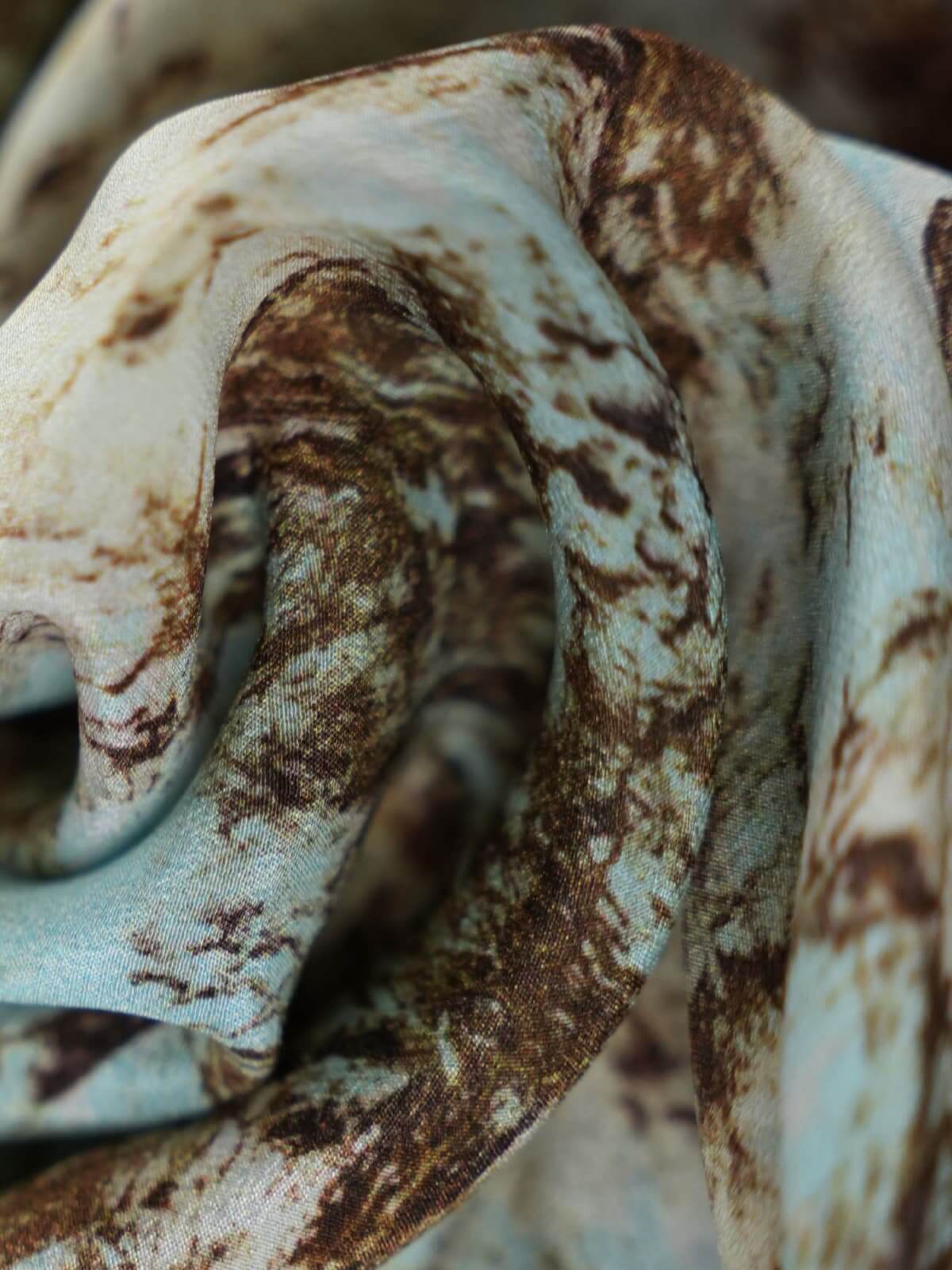 Close-up of the fabric showing the unique pattern of the Vintage Print Mulberry Silk Dress.